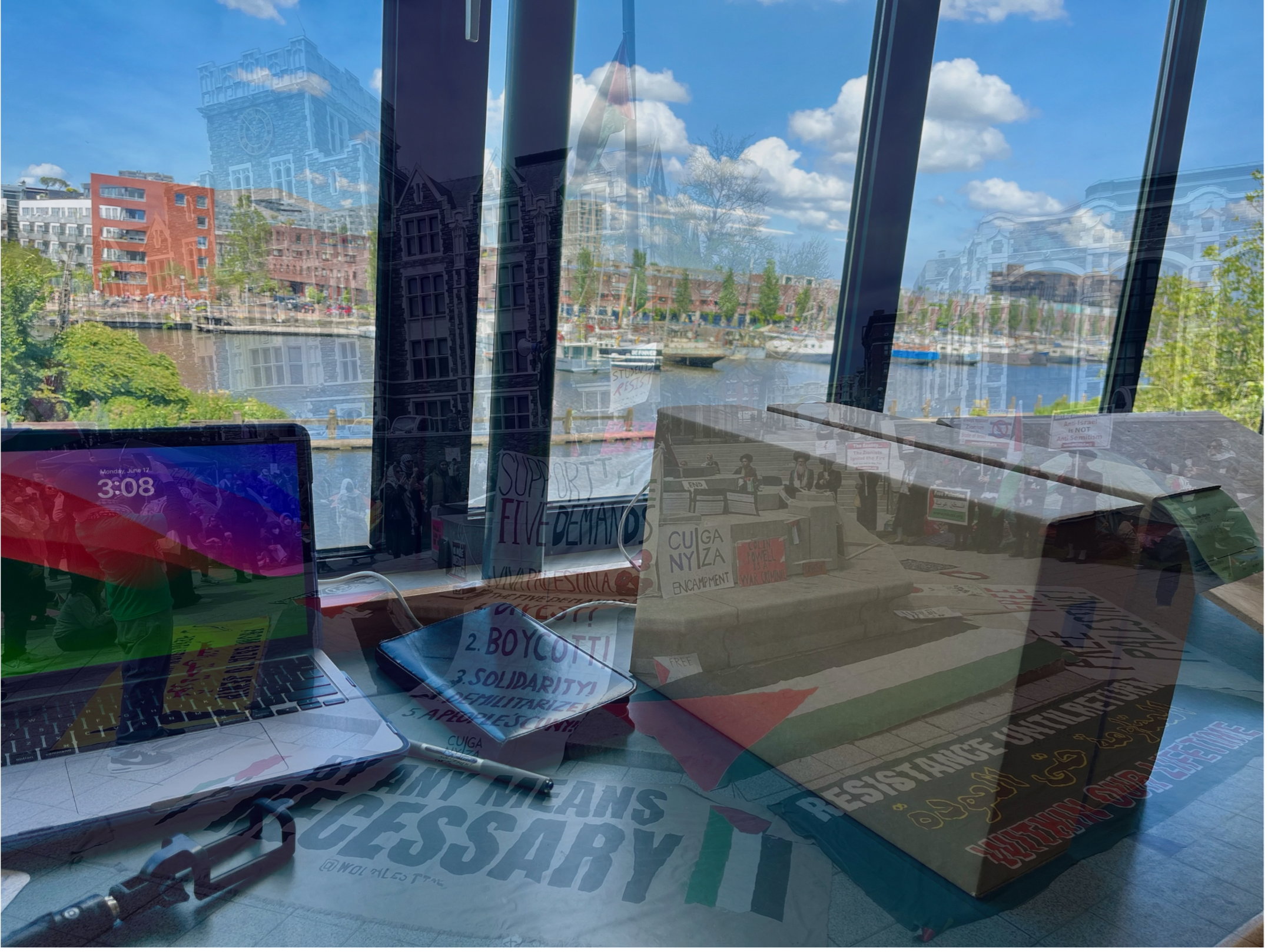 my archival research setup overlooking the harbor at the International Institute of Social History in Amsterdam, overlaid with a semi-transparent image of the CUNY Gaza Solidarity Encampment